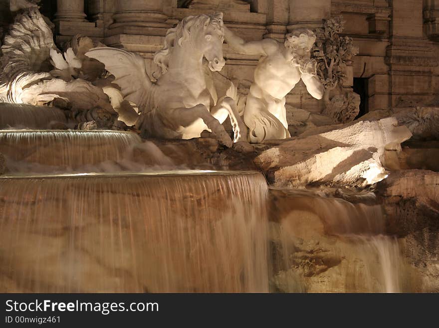 Abundance (Fertilità) Statue (Filippo della Valle) near Ocean (Neptune) Statue - The Trevi Fountain Night (Italian: Fontana di Trevi) Rome Italy Europe. Abundance (Fertilità) Statue (Filippo della Valle) near Ocean (Neptune) Statue - The Trevi Fountain Night (Italian: Fontana di Trevi) Rome Italy Europe