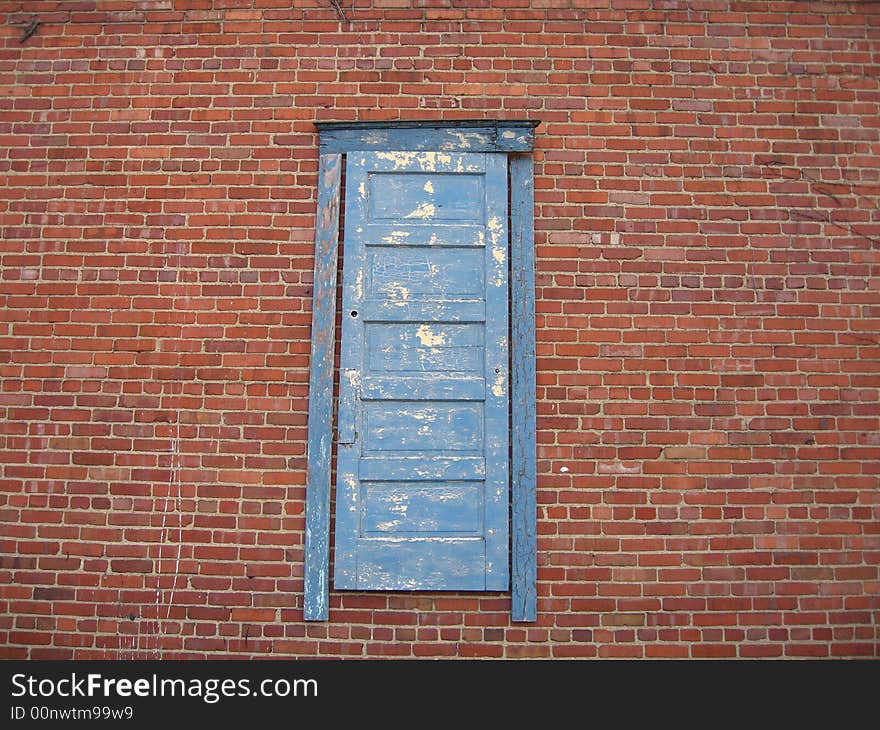 Antiqued blue door to where?