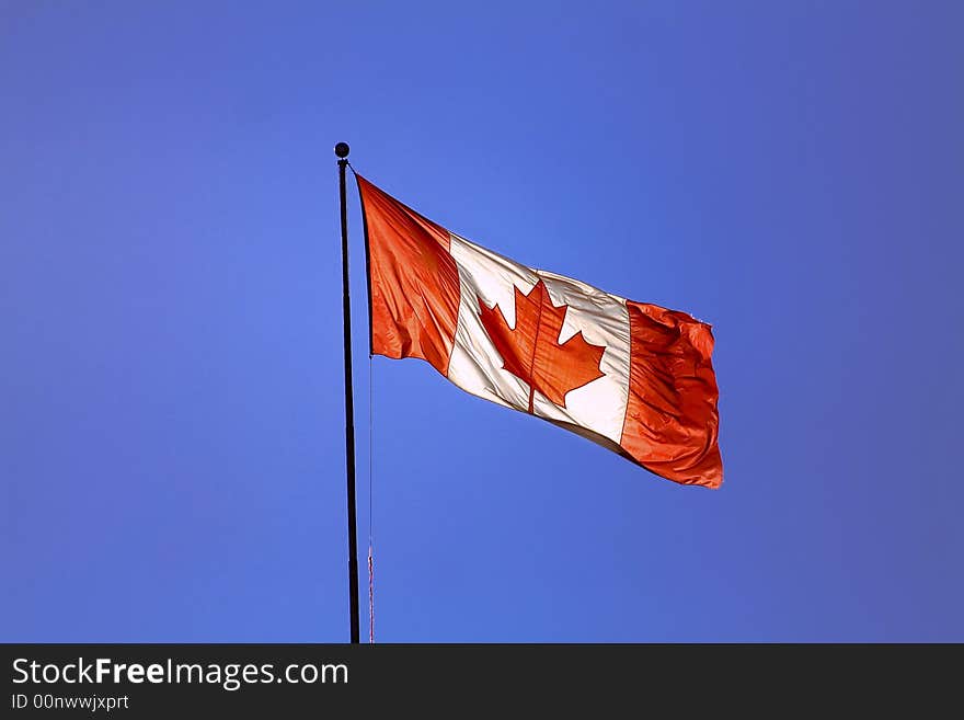 Canadian flag & blue sky