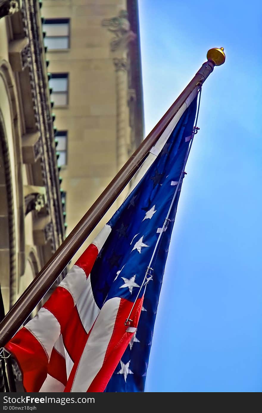 US Flag against blue sky