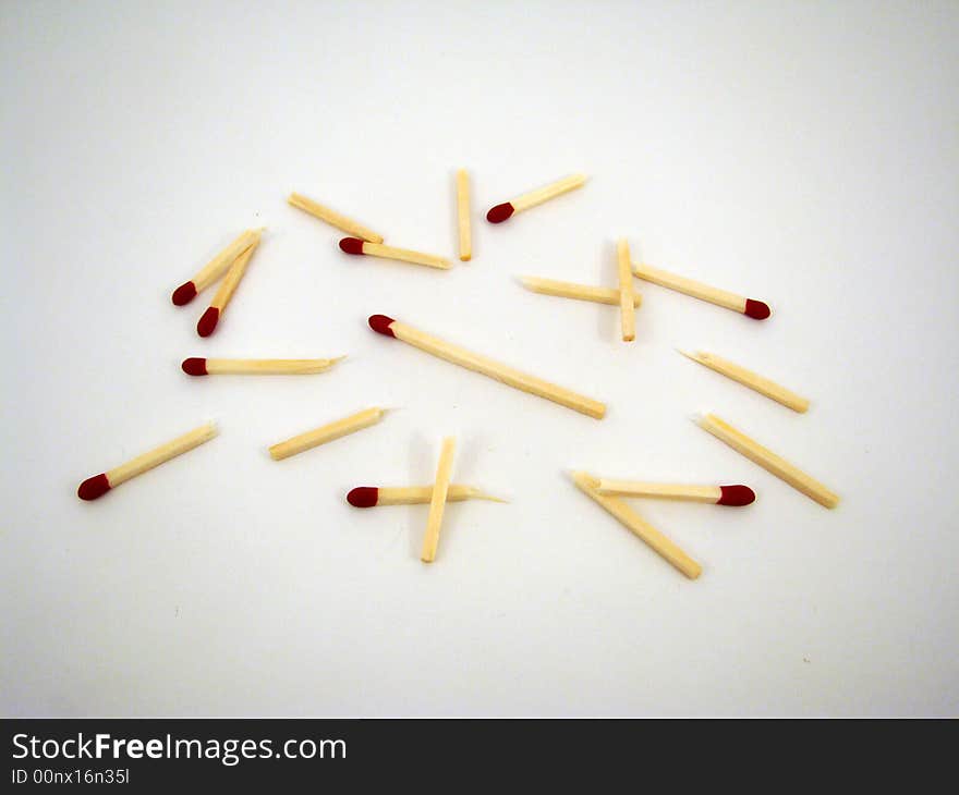 A pile of matches in various positions.