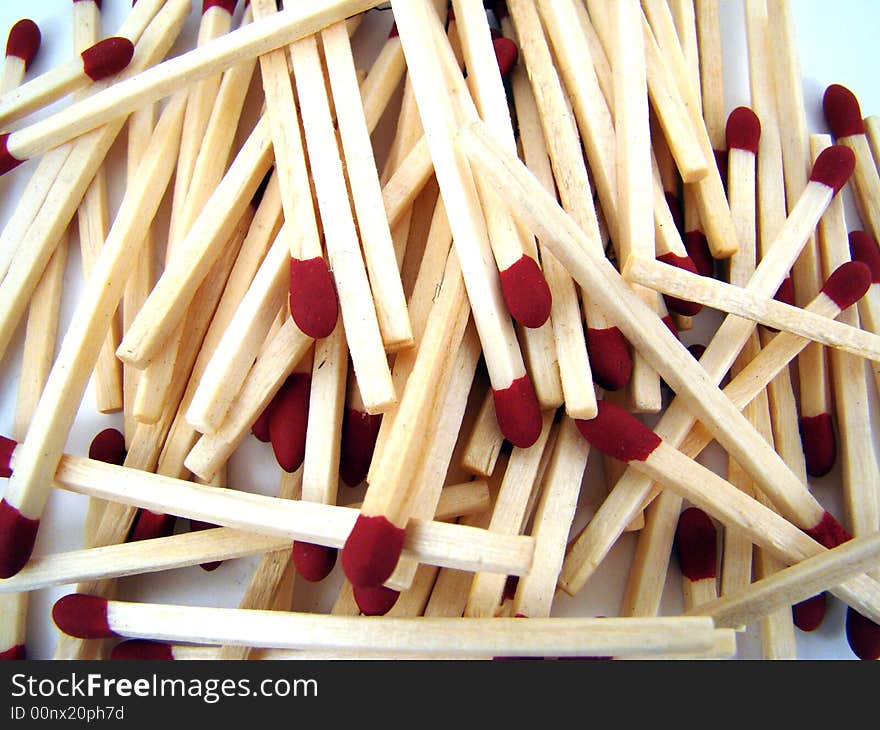 A pile of matches in various positions.