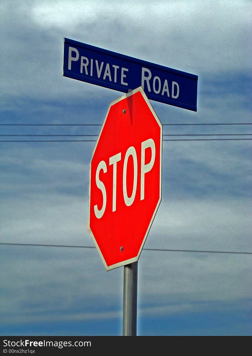 Stop sign and blue Private Road sign.