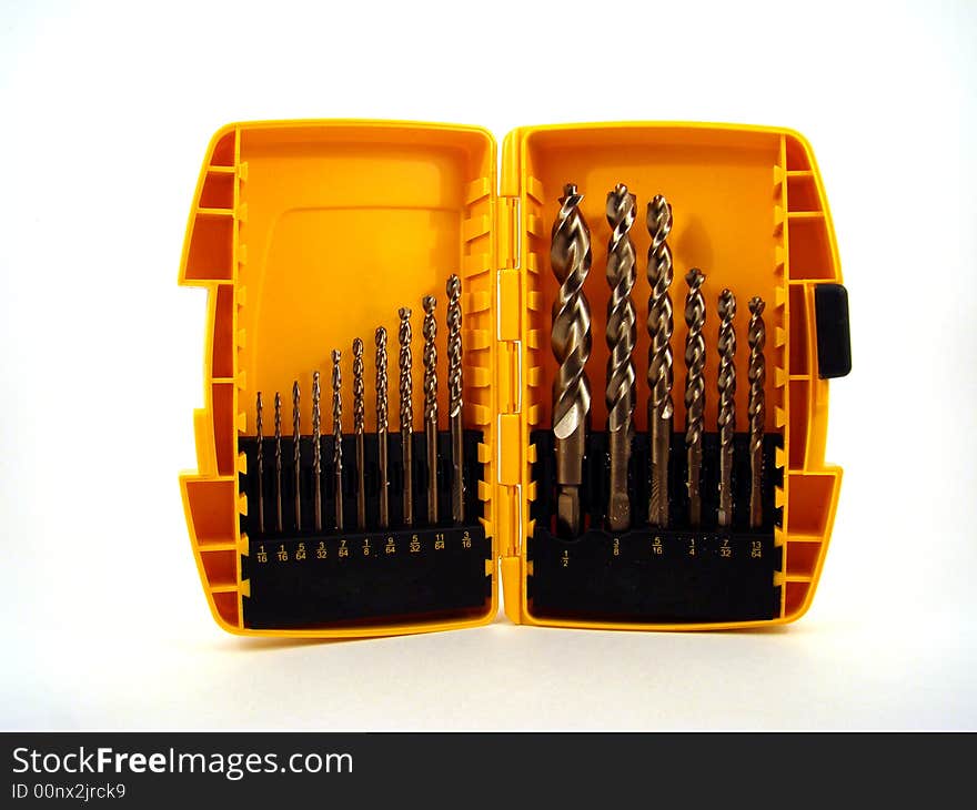 A yellow box of metal drill bits.