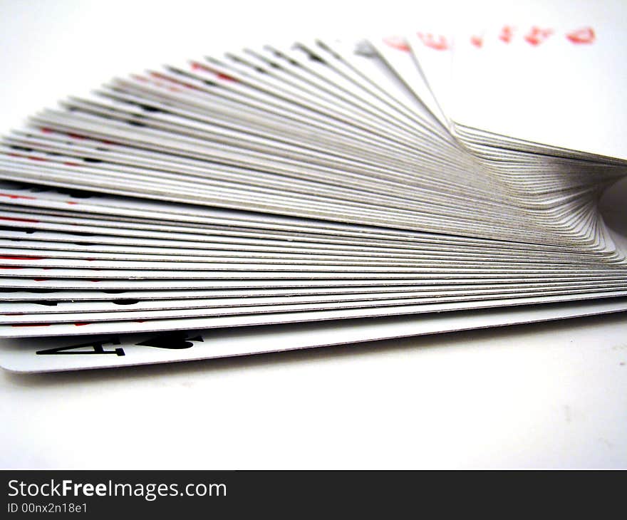 Playing cards on a table in order.