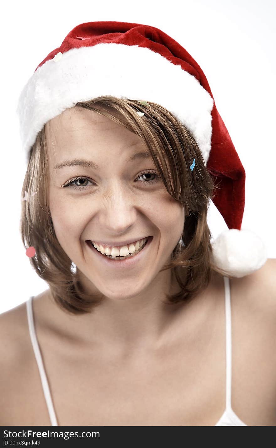 Girl in santa's hat with confetti