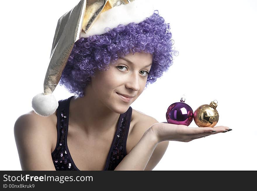 Girl in santa's hat and purple wig. Girl in santa's hat and purple wig