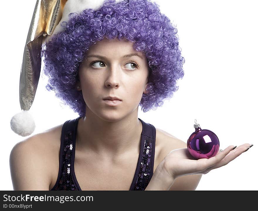 Girl in santa's hat and purple wig. Girl in santa's hat and purple wig