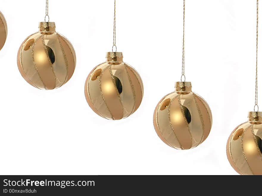 Gold Christmas Bulbs Isolated on a White Background