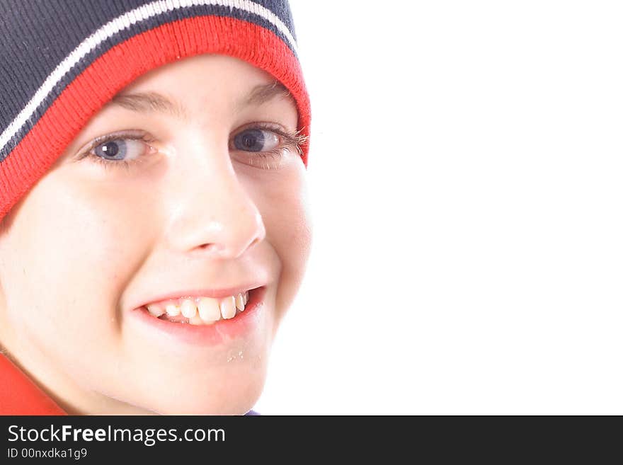 Young boy with gorgeous blue eyes isolated on a white background