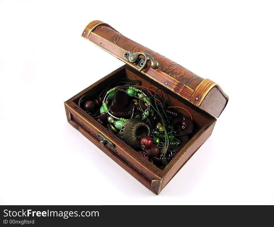 Open wooden box full of jewelery