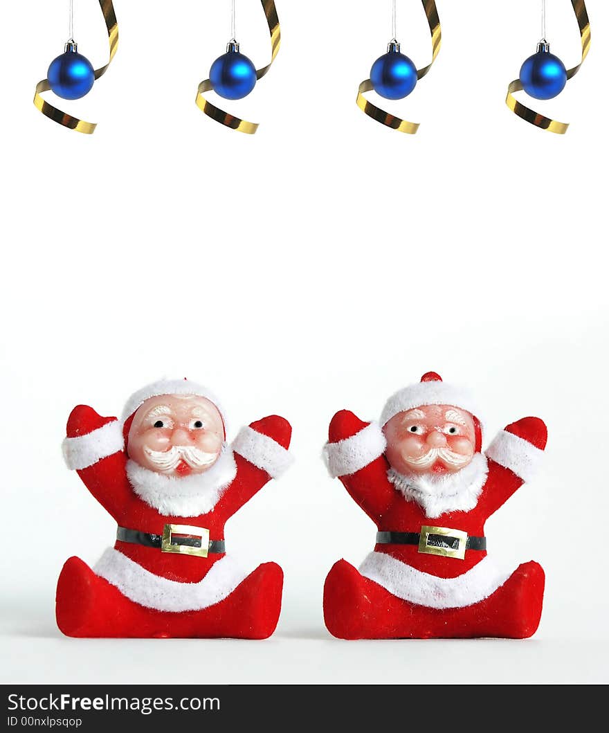 Two  Santa Claus Figurines with blue balls. Two  Santa Claus Figurines with blue balls