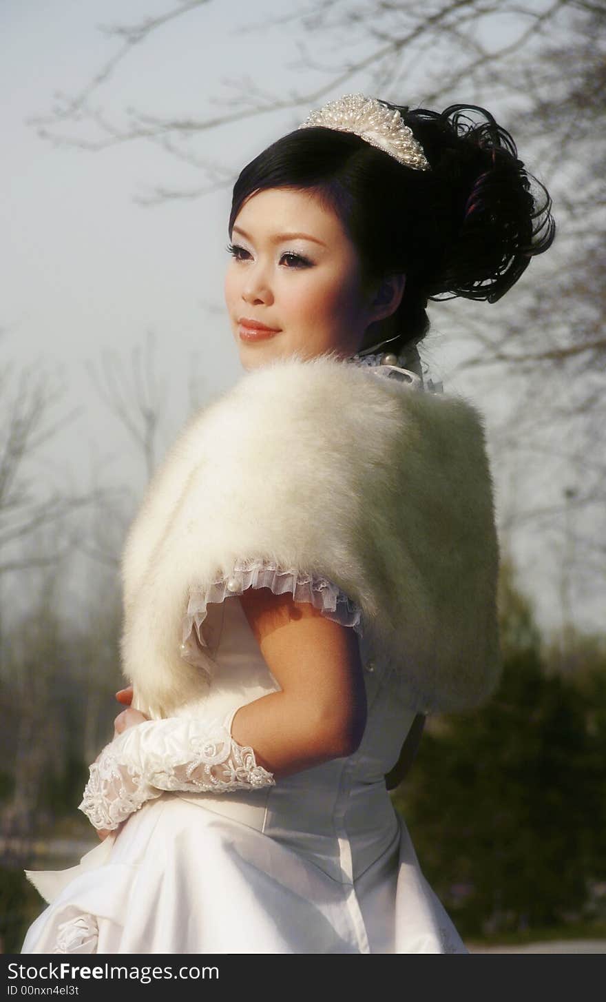 A chinese girl in white wedding dress. A chinese girl in white wedding dress