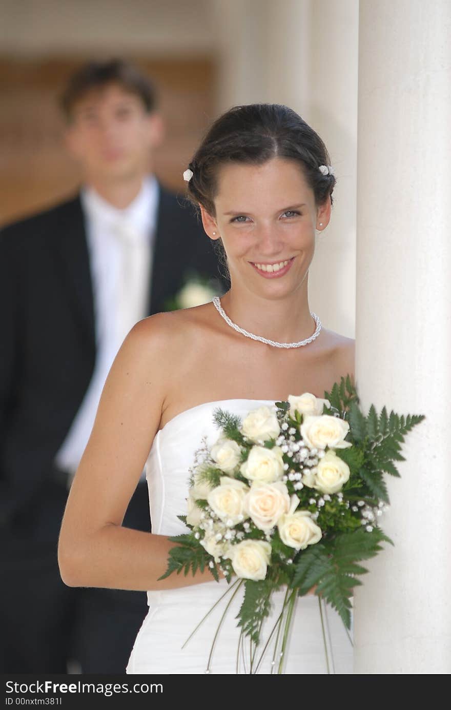 Beautiful young bride with flowers. Beautiful young bride with flowers