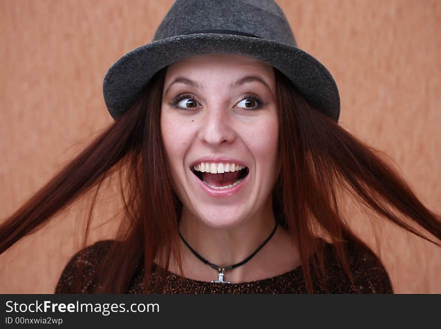 Portrait of a young woman with surprised expression. Portrait of a young woman with surprised expression