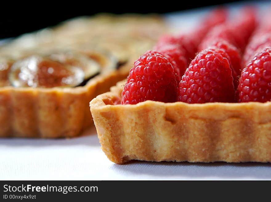 An image of fresh fruit tarts