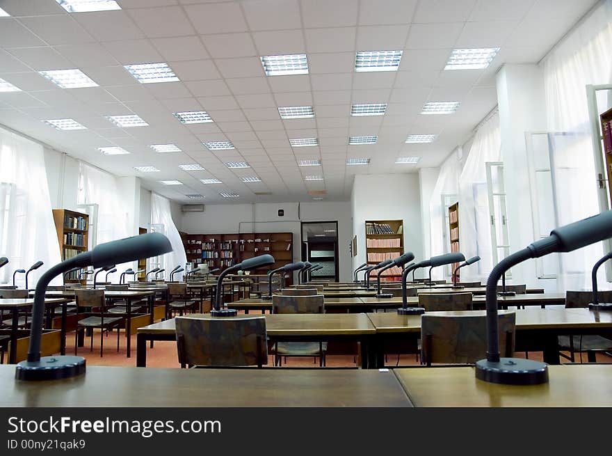 Reading room in library - shelf with old books