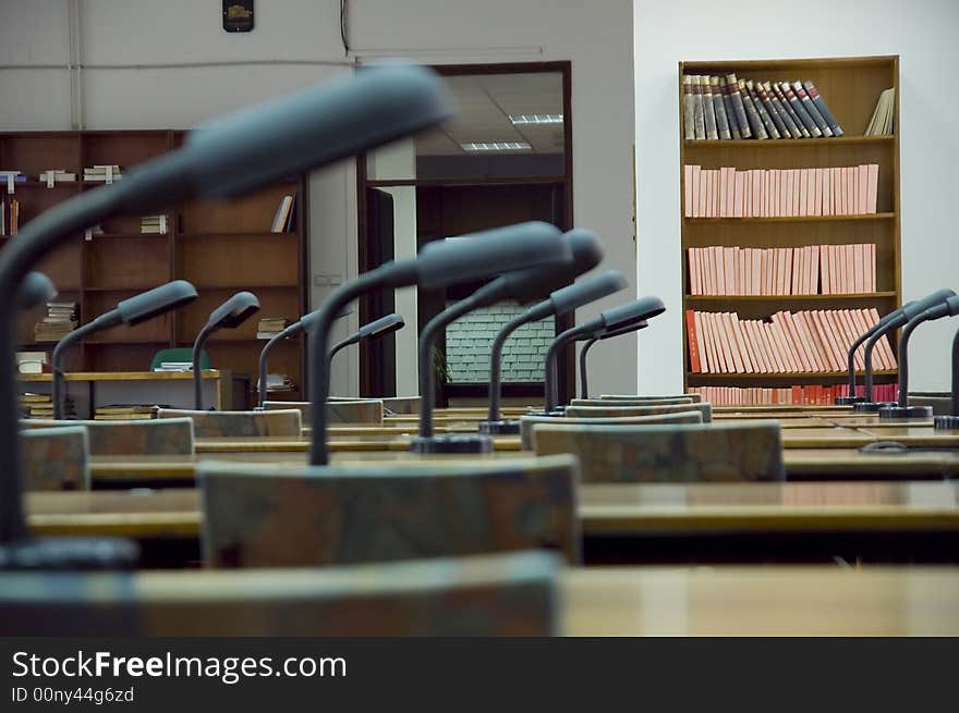 Reading room in library - shelf with old books