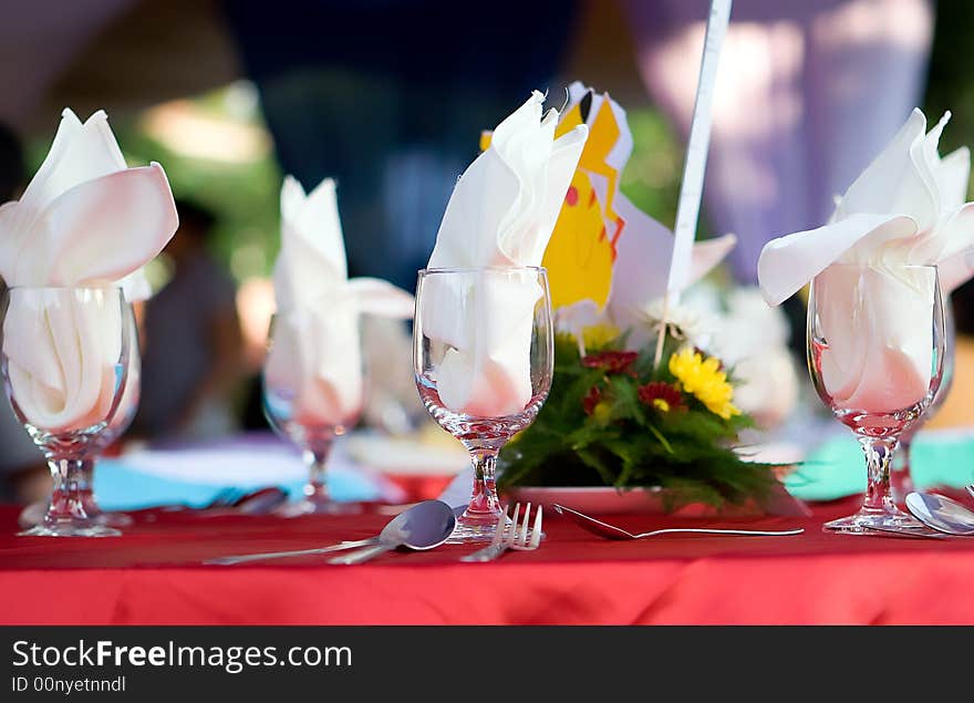 A table view of a few drinking glasses. A table view of a few drinking glasses