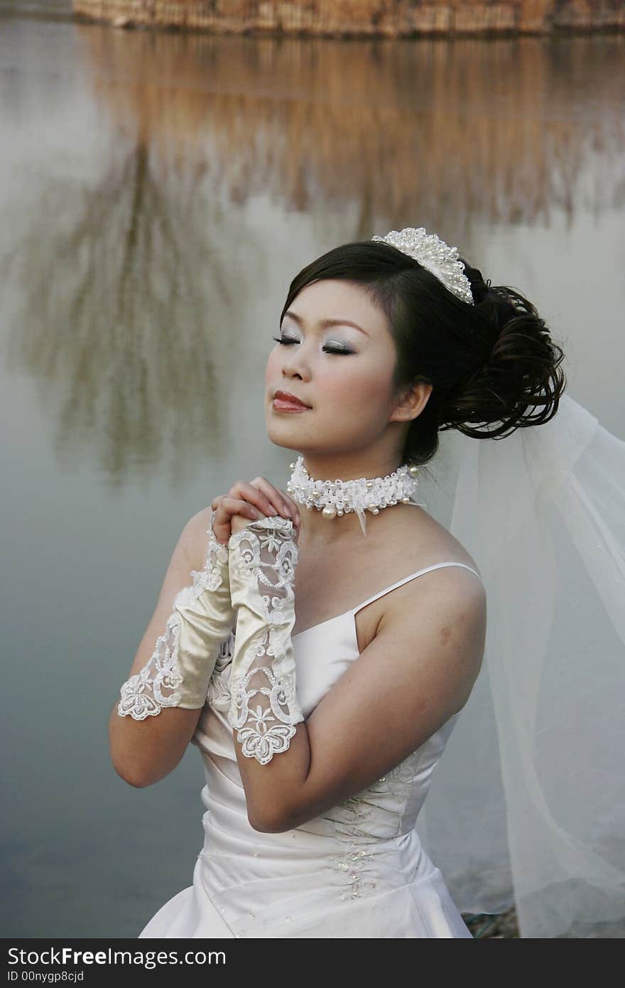 A chinese girl in wedding dress. A chinese girl in wedding dress