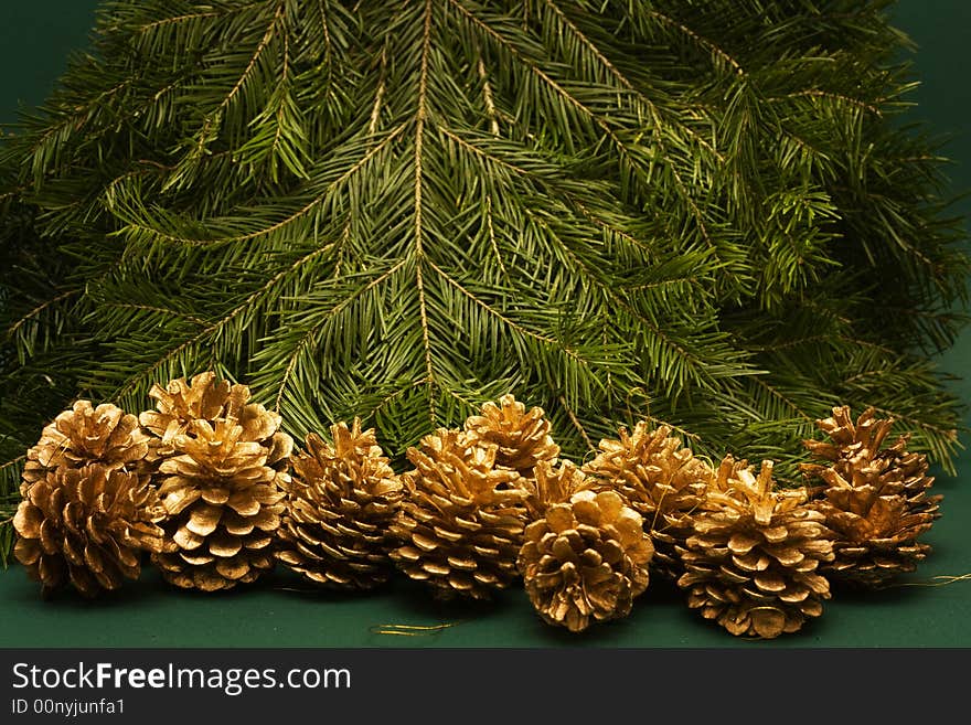 Christmas tree background with cones, copy space on top and center. Christmas tree background with cones, copy space on top and center