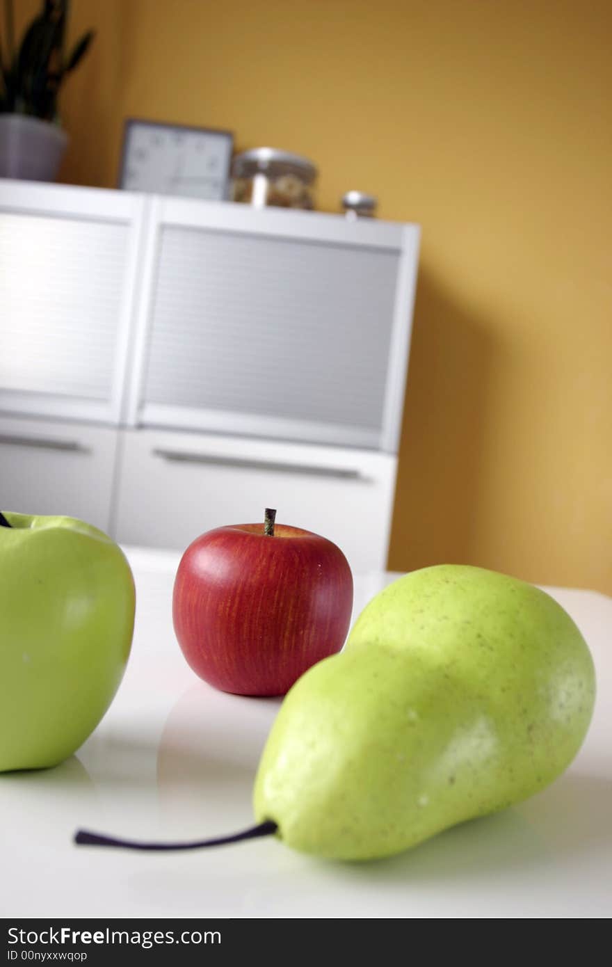 Fruits in modern white kitchen