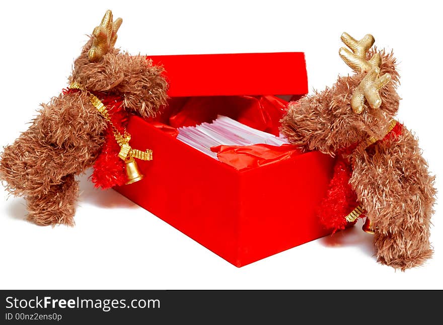 Two mousse leaning over the red gift box on Christmas on white background. Two mousse leaning over the red gift box on Christmas on white background