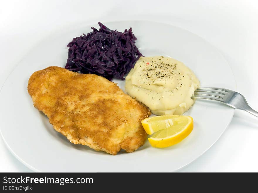 Viennese steak,puree with red cabbage.