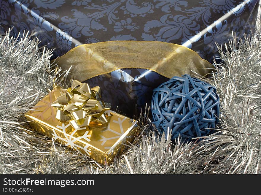 Christmas gifts, presents, wrapped with decorative stars and ribbons composition. Christmas gifts, presents, wrapped with decorative stars and ribbons composition