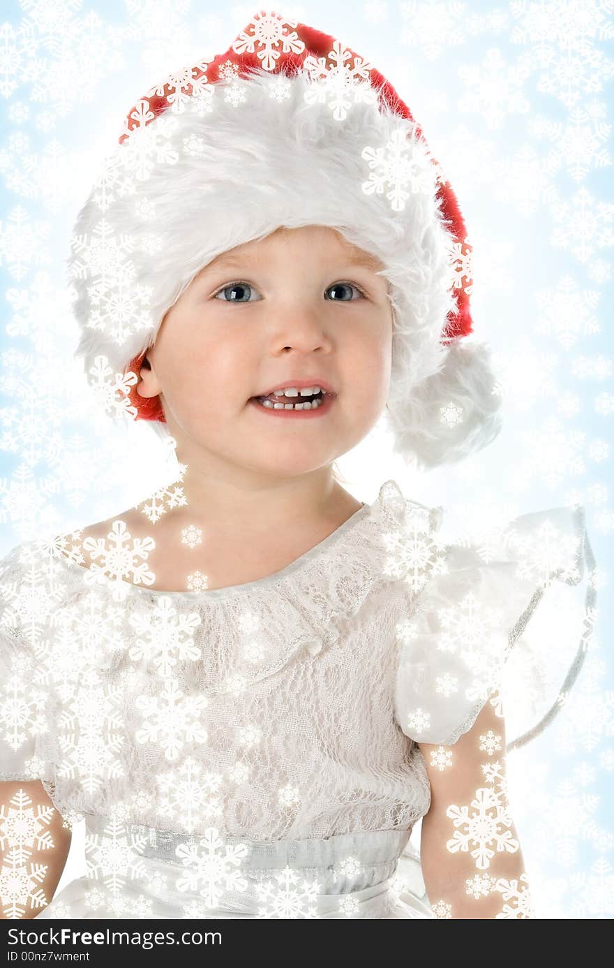 Baby in red hat with snowflake