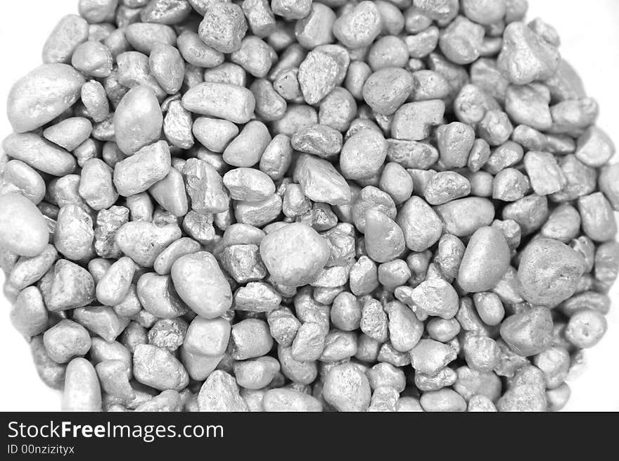 Silver pebble stones isolated on white background