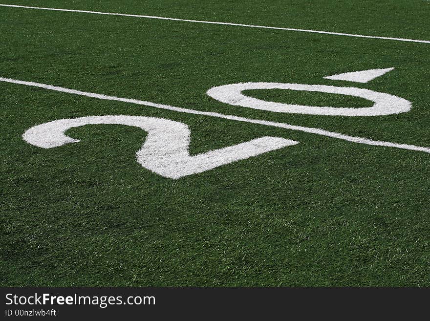 20 yard line in vivid detail at a football stadium. 20 yard line in vivid detail at a football stadium.