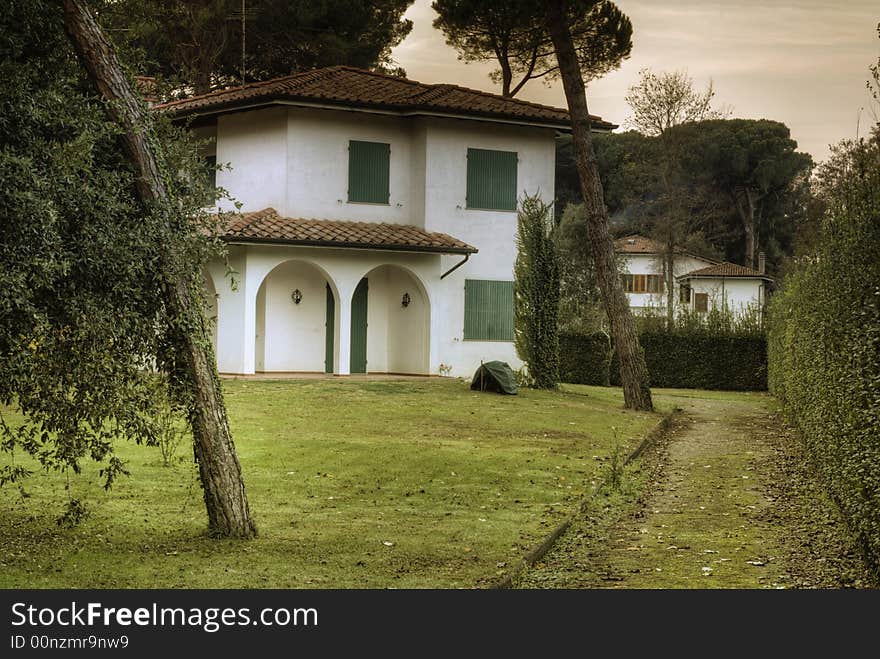 Estate with a garden at sunset. Estate with a garden at sunset