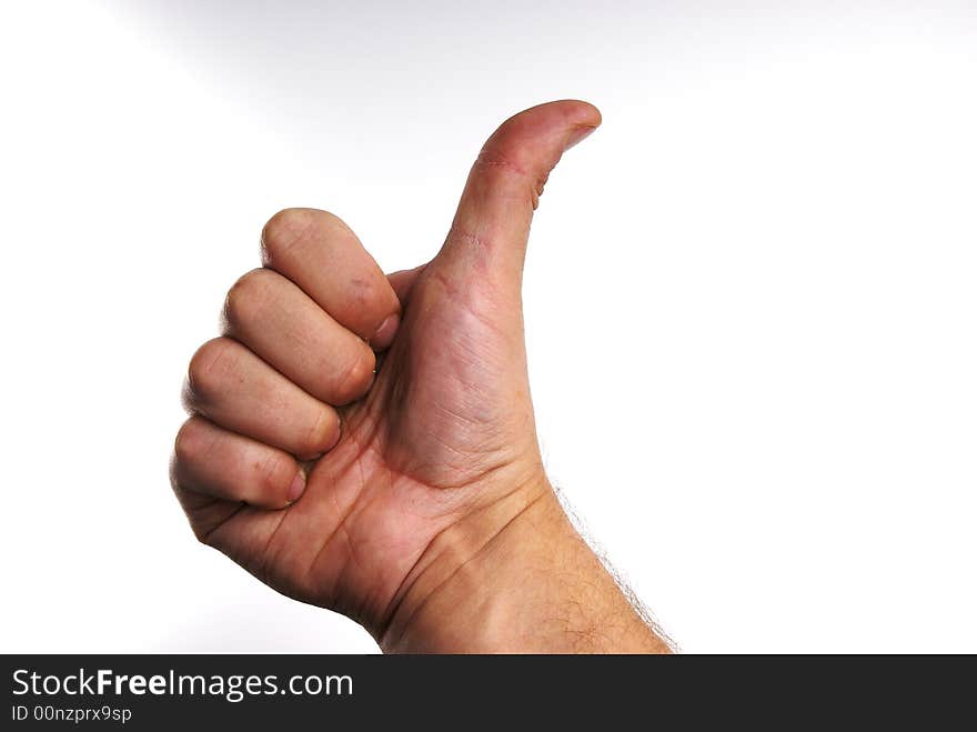 A shot of a hand giving a thumb's up. A shot of a hand giving a thumb's up.