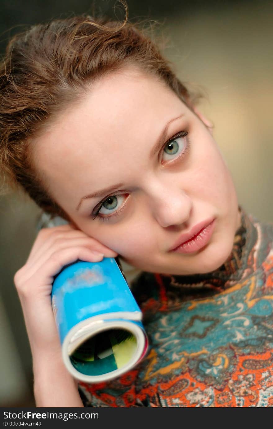 Portrait of young woman with  book in hands. Portrait of young woman with  book in hands