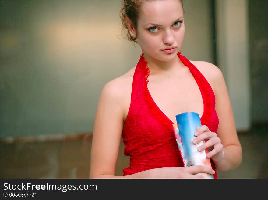 Portrait of young woman with  book in hands. Portrait of young woman with  book in hands