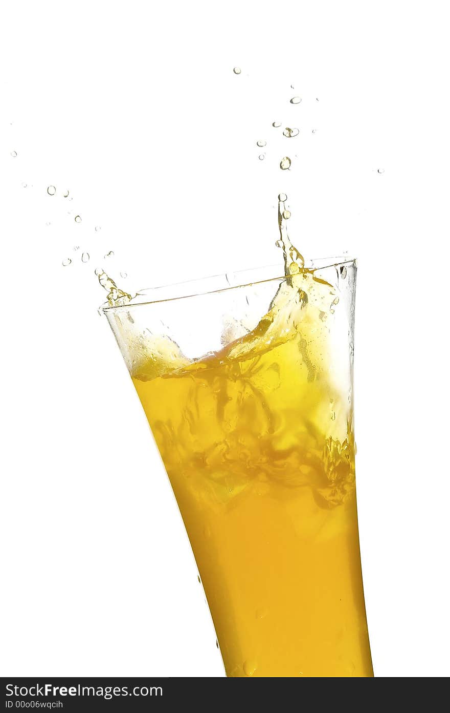 Glass with juice on the white background