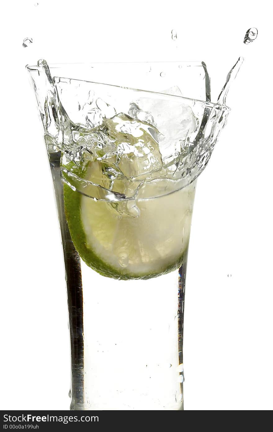 Glass with juice and lemon on the white background