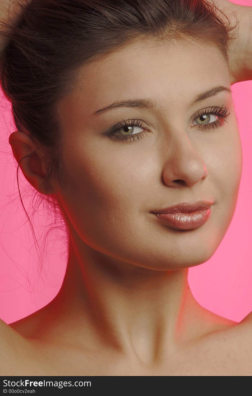 Woman looks in camera in studios, close. Woman looks in camera in studios, close