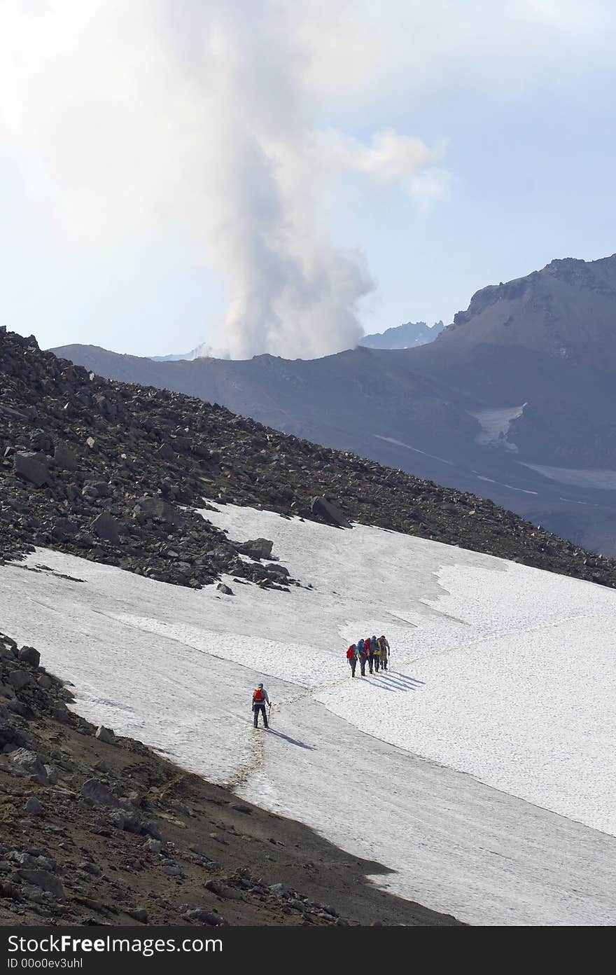 Tourists near volcano.  Kamchatka. Russia. Tourists near volcano.  Kamchatka. Russia.