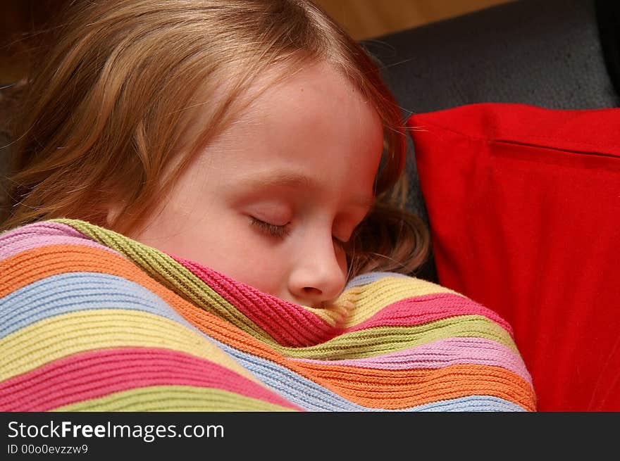 4 years old girl sleeping on couch in the living room. 4 years old girl sleeping on couch in the living room