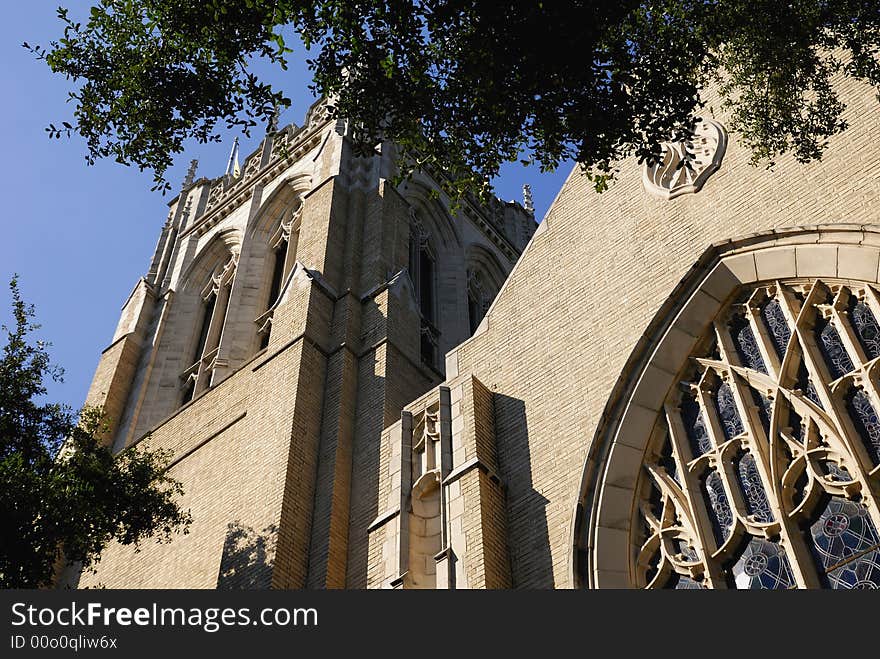 An ornate church against a bright blue sky. An ornate church against a bright blue sky.