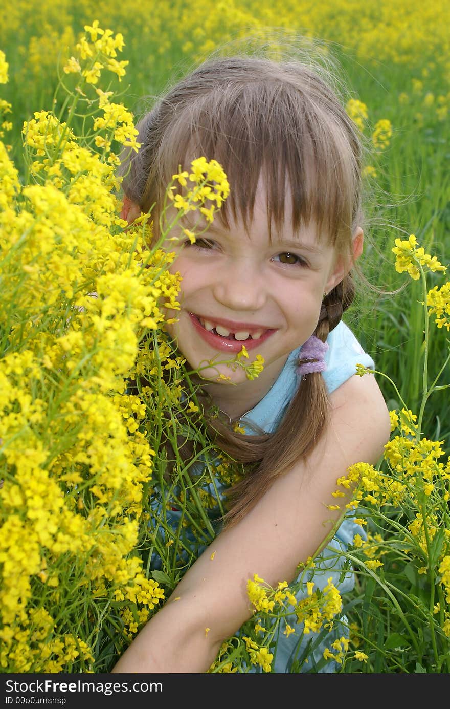 Girl at  a field of flowers