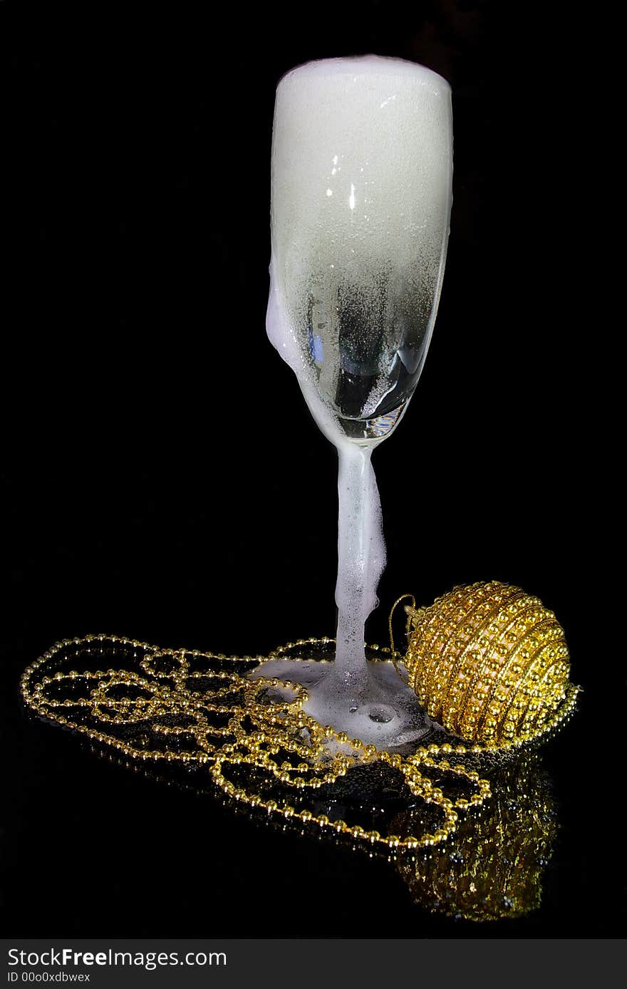 Glass Of Champagne And Christmas Decoration