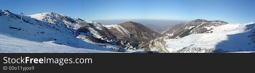 A panorama composition of 3 shots at about 2000m over western alps in italy (Artesina). A panorama composition of 3 shots at about 2000m over western alps in italy (Artesina)