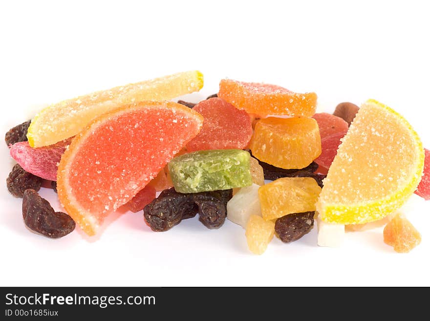 Dried fruits, raisins, candies and nuts on white backgroud. Dried fruits, raisins, candies and nuts on white backgroud