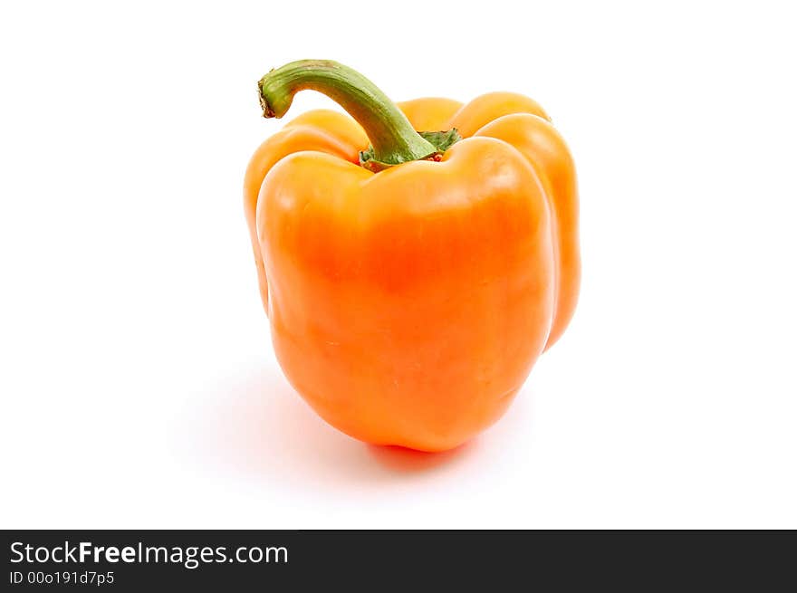 Untypical orange paprika (pepper) isolated on white background