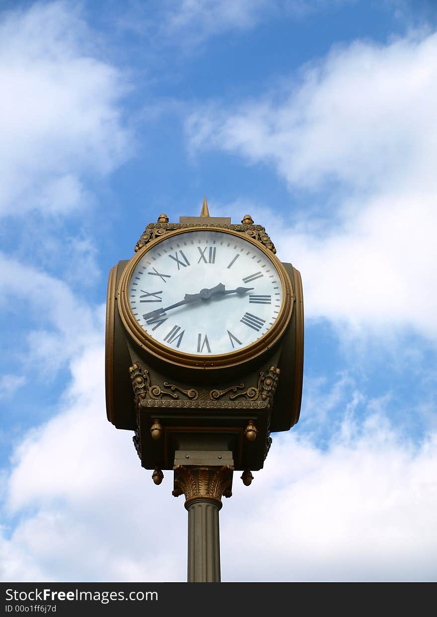 Large clock against blue sky. Large clock against blue sky