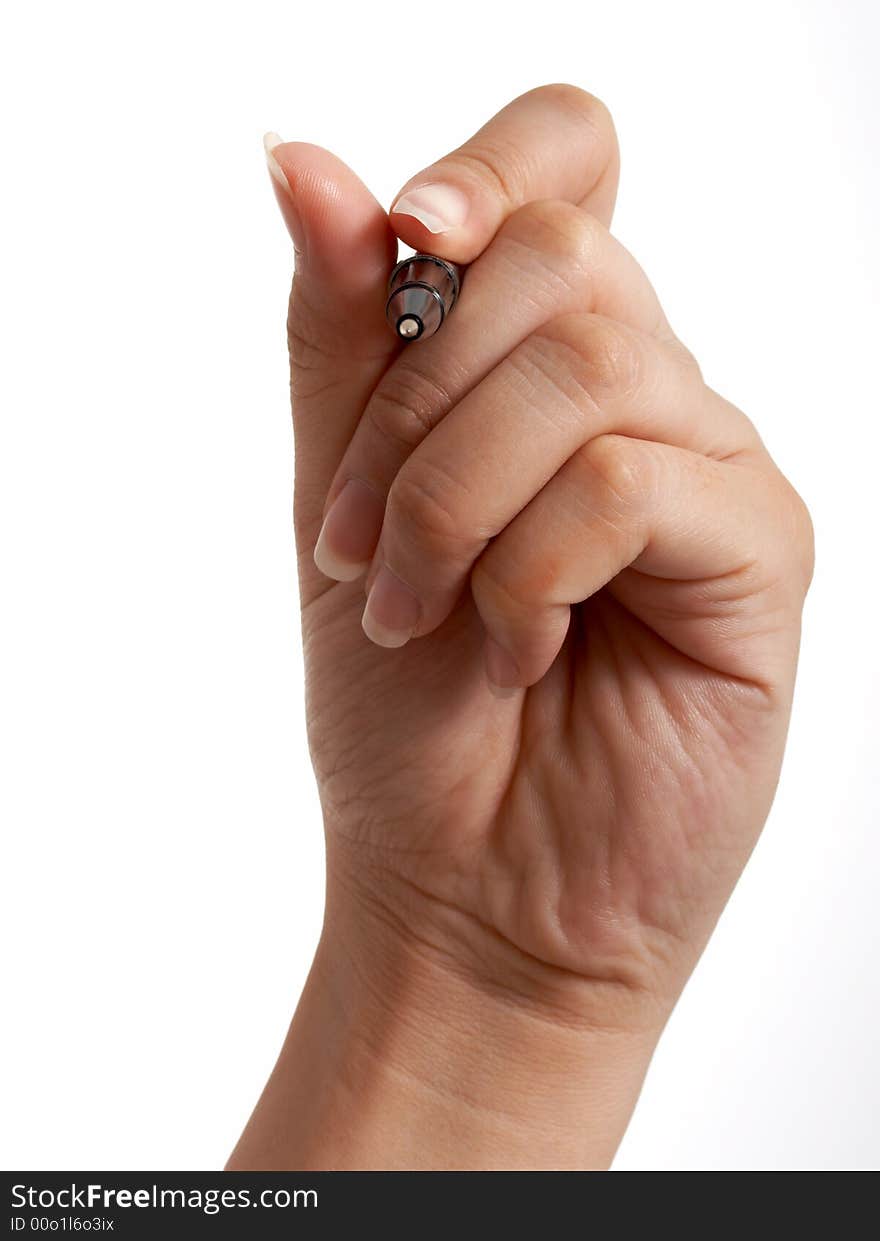 A hand holding a pen over a white background