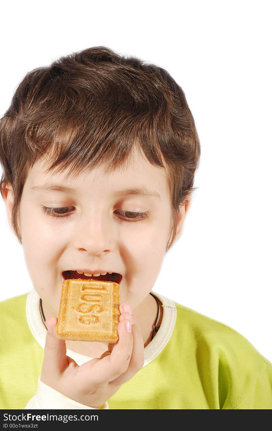 Kid eating dollar cookies on white background